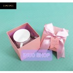 Caja con bolsa para regalo con lazo rosa